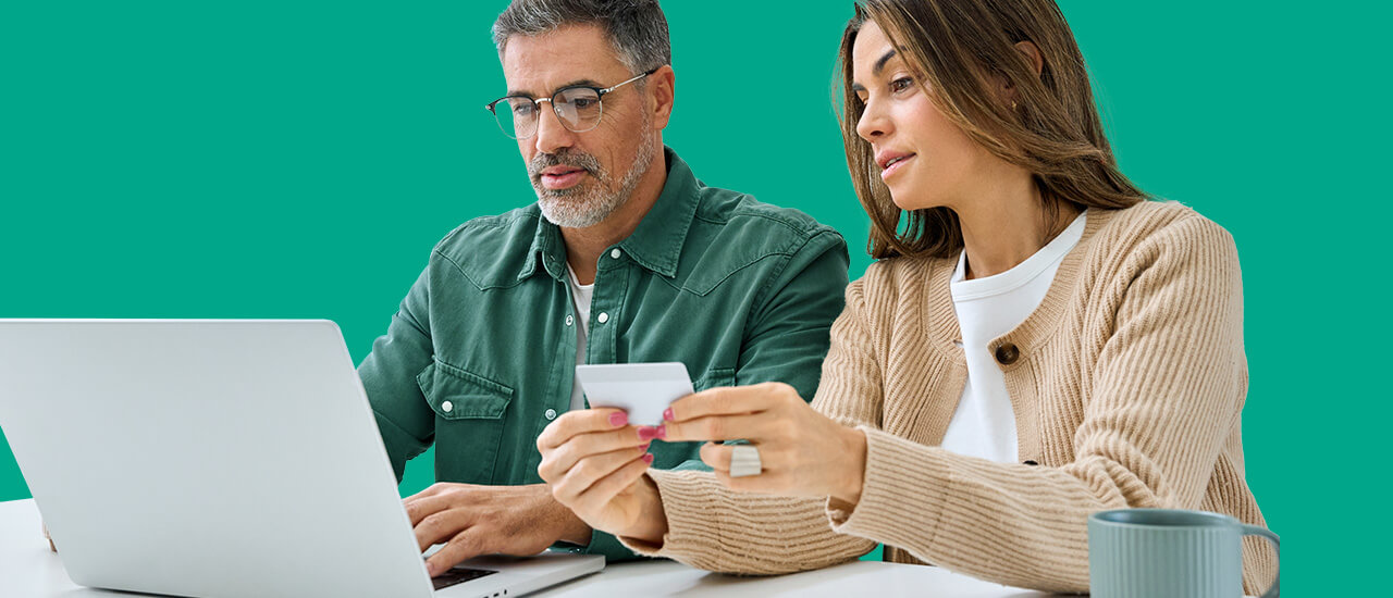 Man leans against blue car