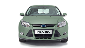 Mint green coloured car with personalised Rias plate