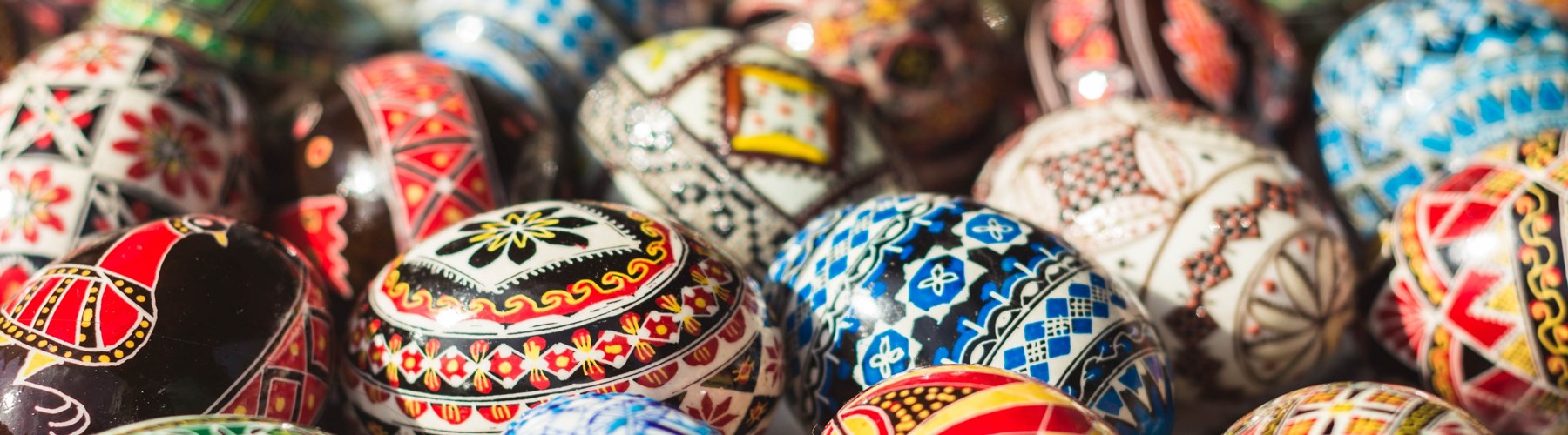 Multi-coloured hand-painted rustic Easter eggs