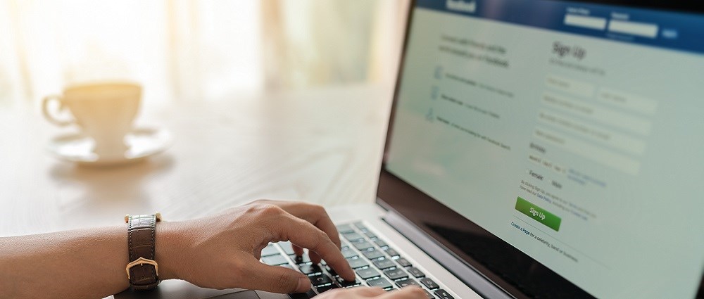 Man entering his details on Instagram 