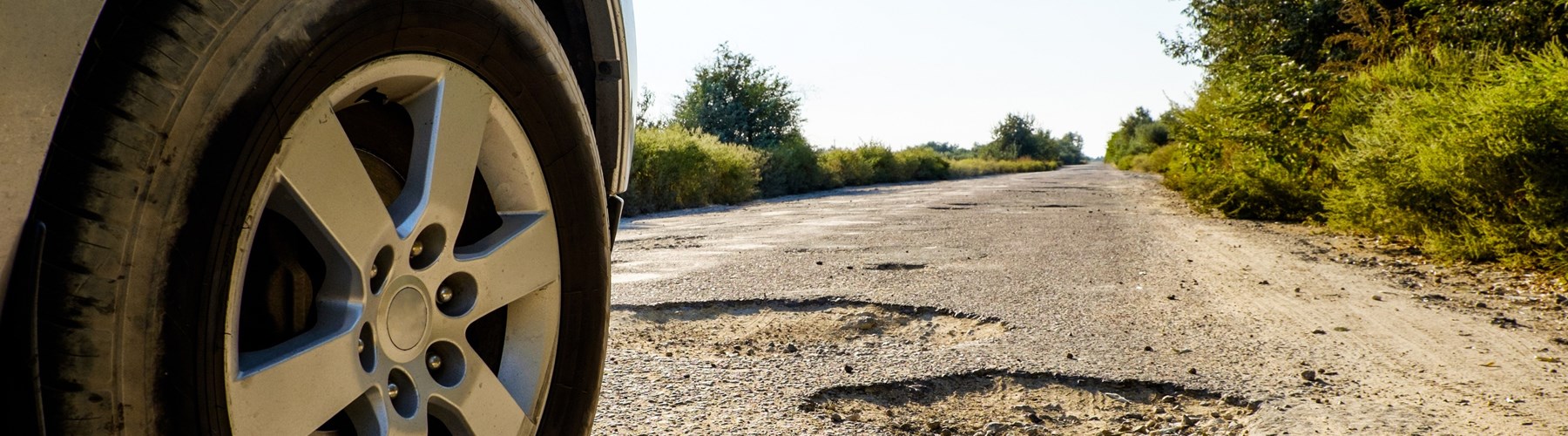 Road with pothole