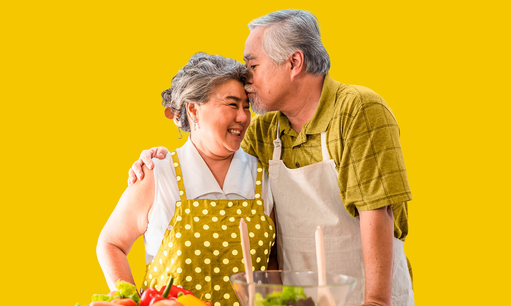 A welcome door mat by an open door next to a pair of red wellies